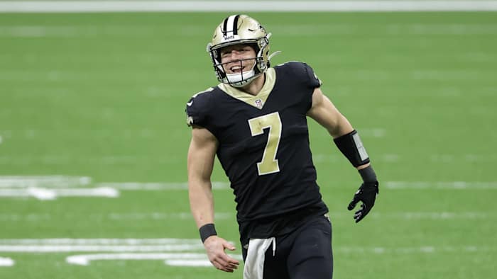 Saints' Taysom Hill celebrates after a big play on the field